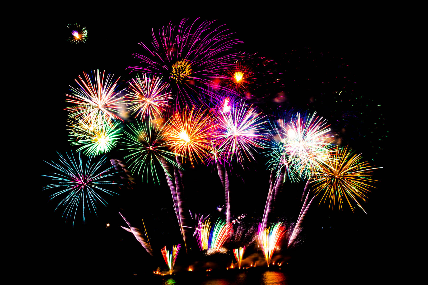 Beautiful color fireworks display on black sky at night for celebration